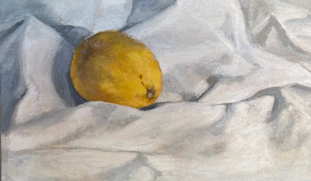 A painting of a lemon sitting in draped piece of canvas cloth.