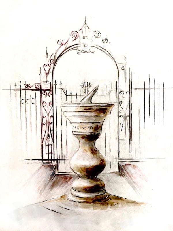 A sundial atop a curved base, with an metal gate in the background. On the side of the sundial, the word "moment" is written.