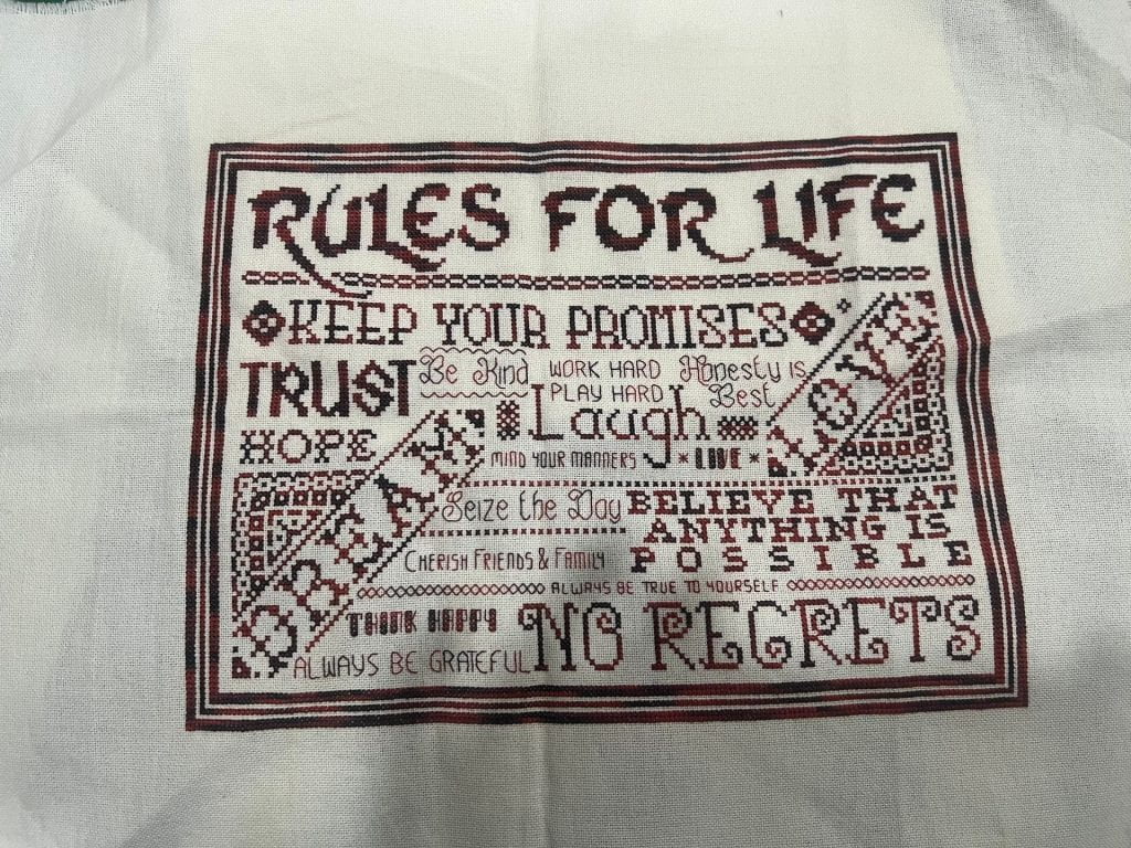 A stitched word collage under the headline "Rules for Life." Phrases include "keep your promises," "trust," "no regrets," and "believe that anything is possible."