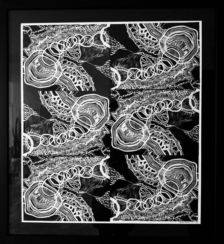 A black and white piece featuring 6 cells all showing black and white abstract designs of circles in the center with radiating lines as well as white patterns against a black background.