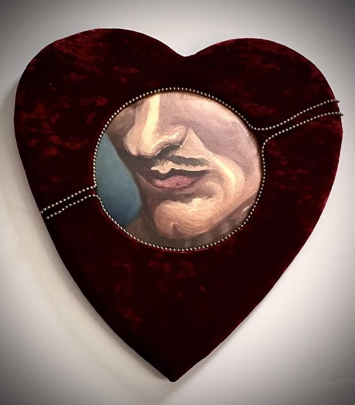 Wall sculpture of red velvet heart, oil on canvas of a man's lips, convex glass.