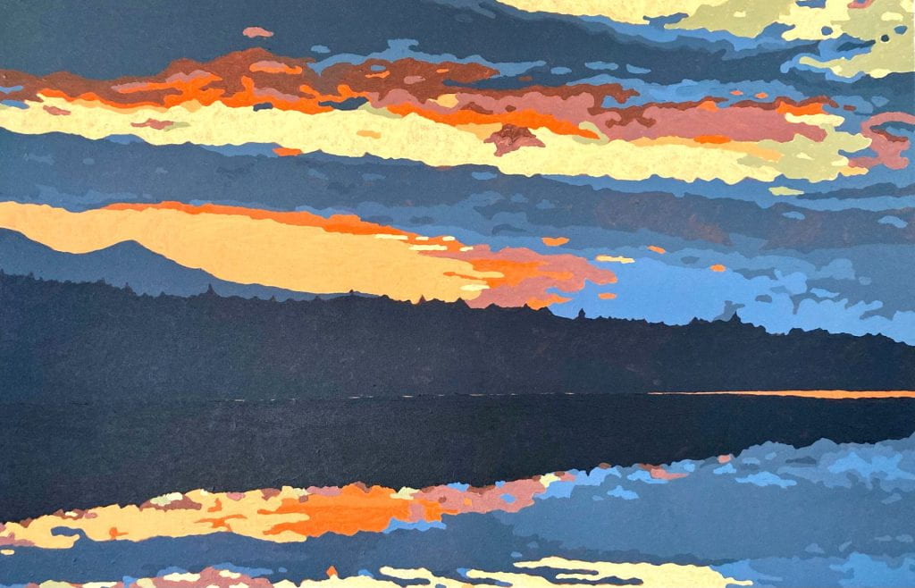 A sublime sky of daffodil yellow, light and wildfire orange, steel and dark blue is reflected on the surface of a lake from which a mountain hill rises. The forms of the landscape are hardly distinguished.
