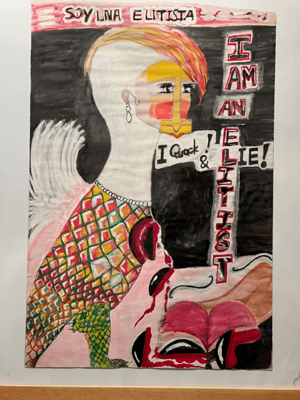 This is an ugly duck like figure with white feathers, and orange hair, wearing an earing in her human ears, her body resembles a reptile with only one leg, green in color, and her skin is scaly. Her somewhat like heart is black and bleeding, detached from her chest, broken into pieces, dropping down to the ground. There are letterings on the painting, the paragraph one on top of the page is written in Spanish and says: "Soy una Elitista". The second one placed on the right side of the page is written in English and it reads: "I am an Elitist. I Quack & Lie!".